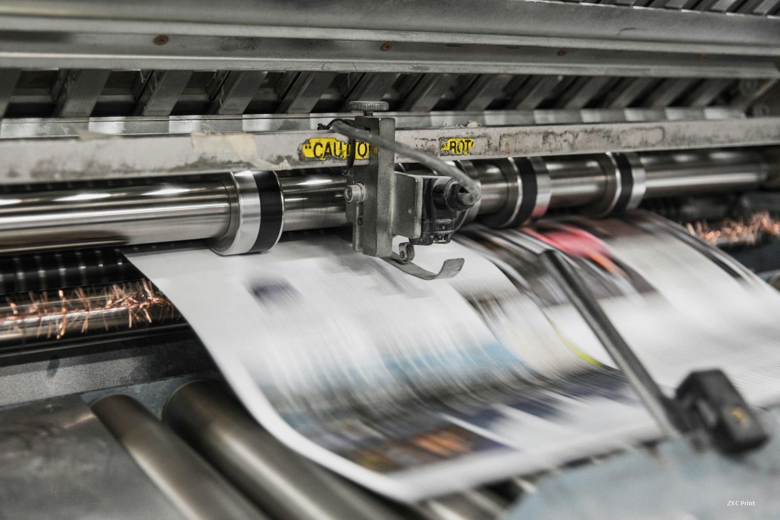 Printing press in motion during a production run